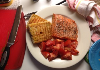 Roast salmon, tomato and watermelon salad and pan con tomate. 